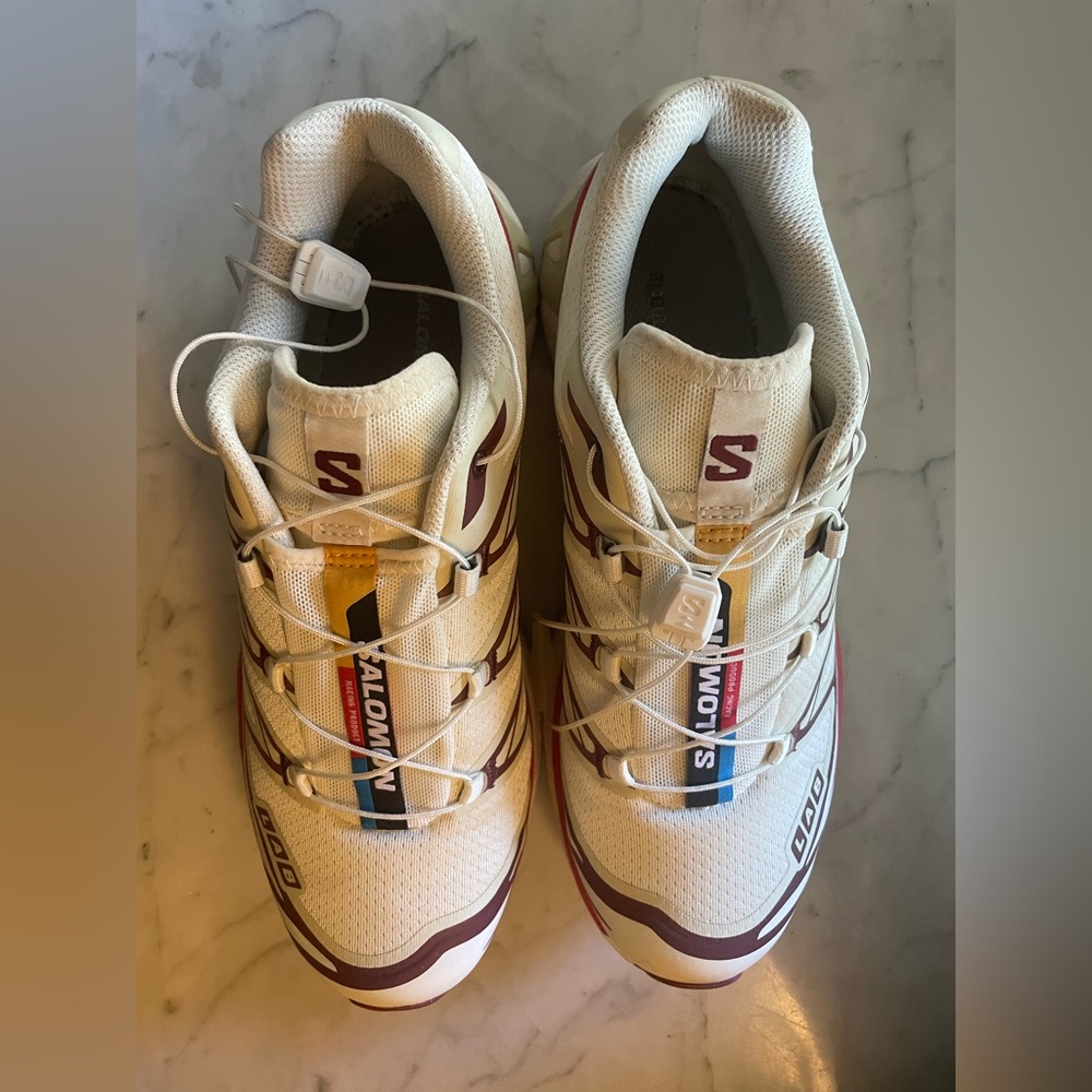 Salomon Women’s (8) and/or Men’s (7) White and Burgundy Athletic Shoes